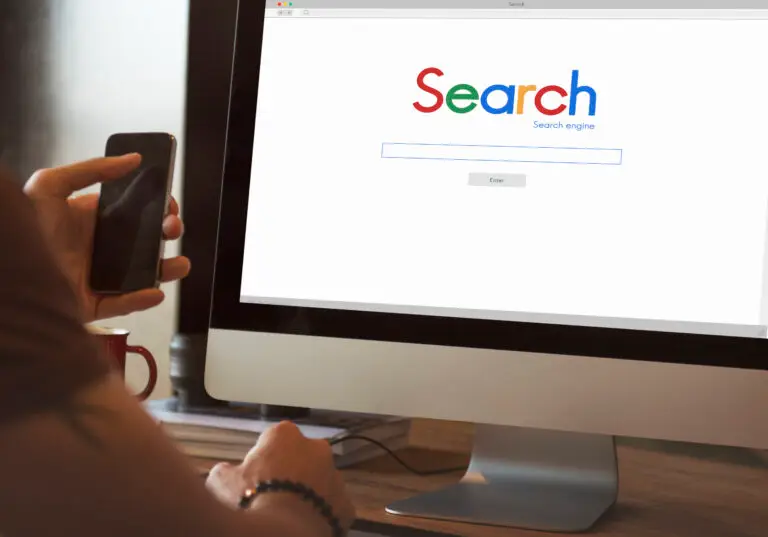 Person searching Google and waiting for results from SEO