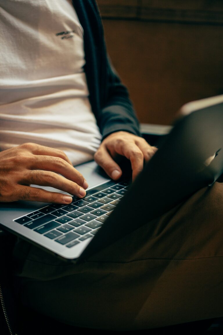 Man researching the cost of SEO on a laptop