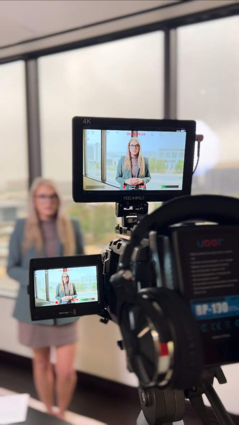 Business owner being filmed for a testimonial video by Gova Creative