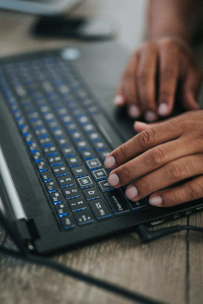 Business owner fixing website SEO issues on a laptop