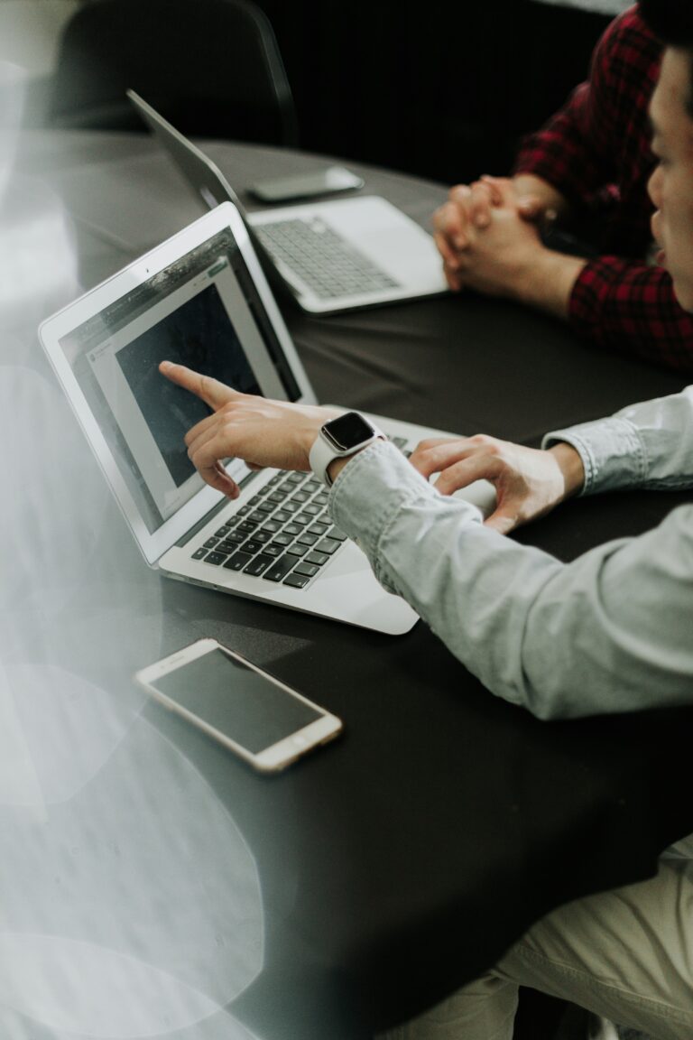 Business owner checking technical SEO settings on a laptop