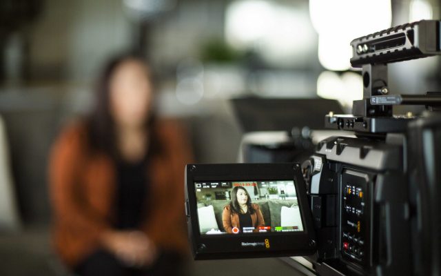 Camera monitor framing an on-camera interview during a Gova Creative video shoot